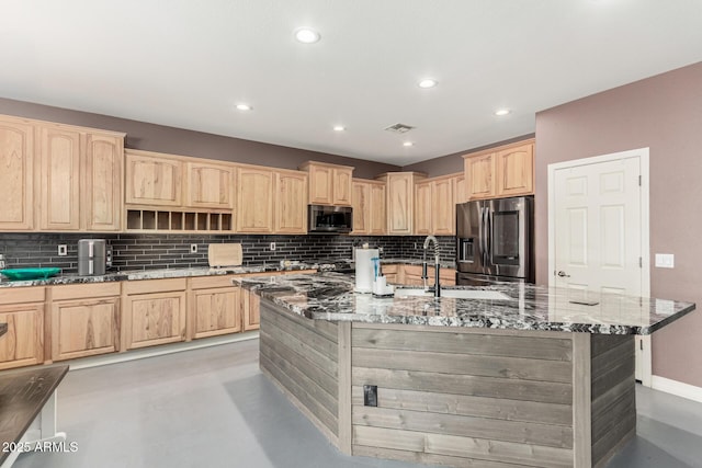 14604 W Banff Ln, Surprise, AZ 85379 - kitchen featuring appliances with stainless steel finishes, light brown cabinets, decorative backsplash, stone counters, and recessed lighting