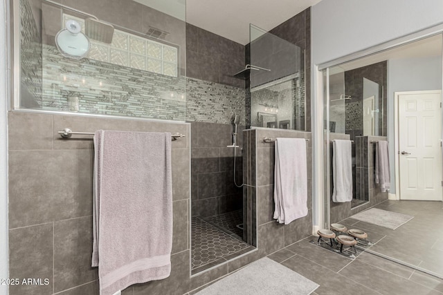 14604 W Banff Ln, Surprise, AZ 85379 - bathroom featuring walk in shower and tile patterned flooring
