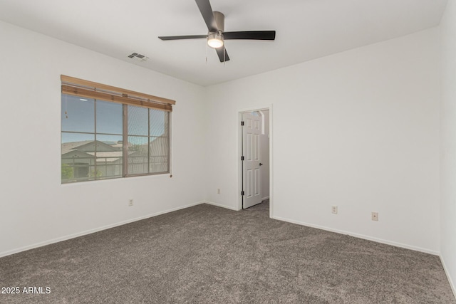 14604 W Banff Ln, Surprise, AZ 85379 - spare room featuring carpet, ceiling fan, and baseboards