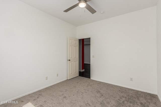 14604 W Banff Ln, Surprise, AZ 85379 - carpeted spare room featuring ceiling fan, baseboards, and a smoke detector