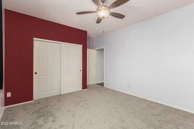 14604 W Banff Ln, Surprise, AZ 85379 - unfurnished bedroom with carpet floors, a closet, ceiling fan, and baseboards