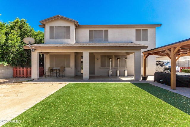 14604 W Banff Ln, Surprise, AZ 85379 - back of property with stucco siding and a patio area