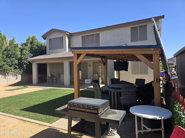 14604 W Banff Ln, Surprise, AZ 85379 - back of property featuring a patio and stucco siding