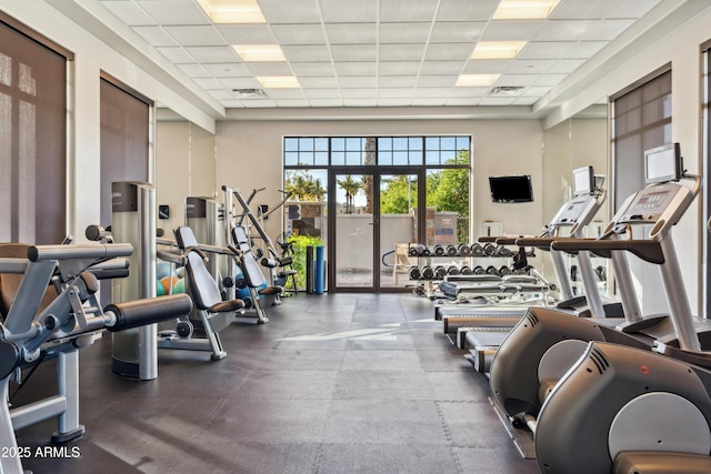 workout area with a drop ceiling