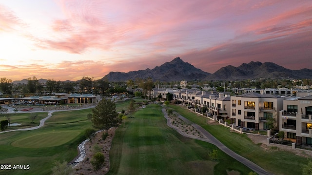 view of home's community featuring golf course view and a mountain view