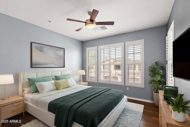 19475 N Grayhawk Dr Unit 2151, Scottsdale, AZ 85255 - bedroom featuring wood finished floors, baseboards, and a ceiling fan