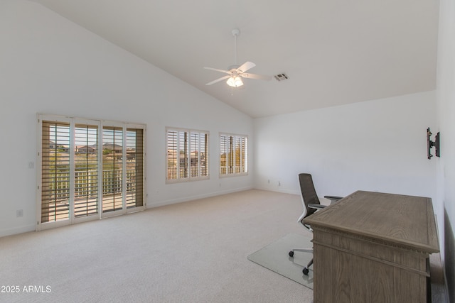 carpeted office space featuring high vaulted ceiling, plenty of natural light, visible vents, and a ceiling fan