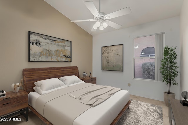 bedroom with a ceiling fan, lofted ceiling, and light tile patterned floors