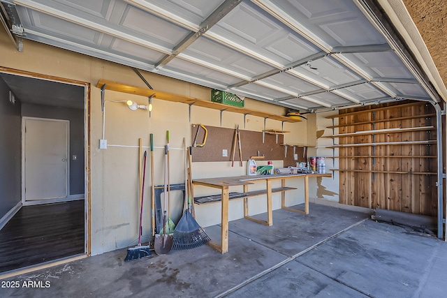 garage with a workshop area
