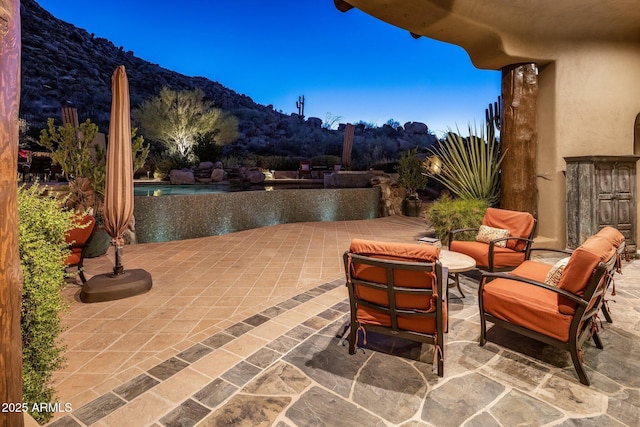 view of patio with a mountain view