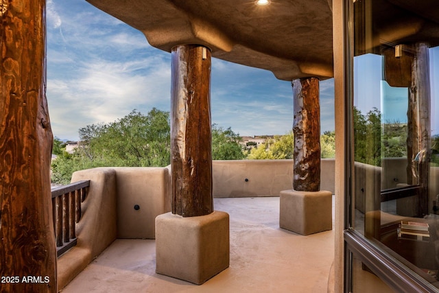 view of patio / terrace with a balcony