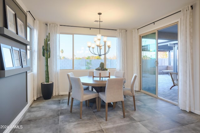 dining room with a chandelier