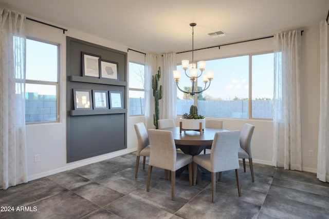 dining room featuring a notable chandelier