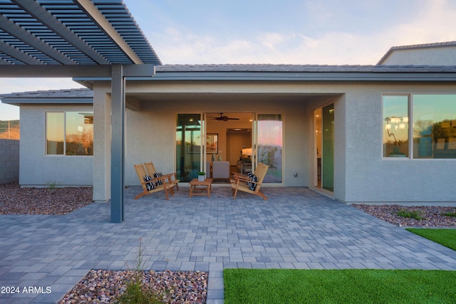 view of patio / terrace with an outdoor living space and a pergola