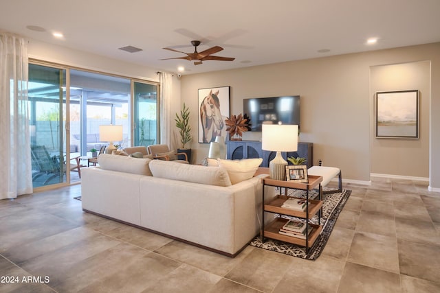 living room featuring ceiling fan