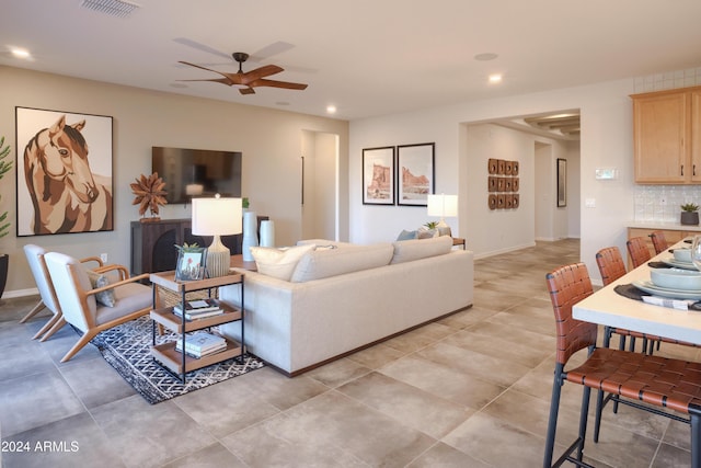 living room with ceiling fan