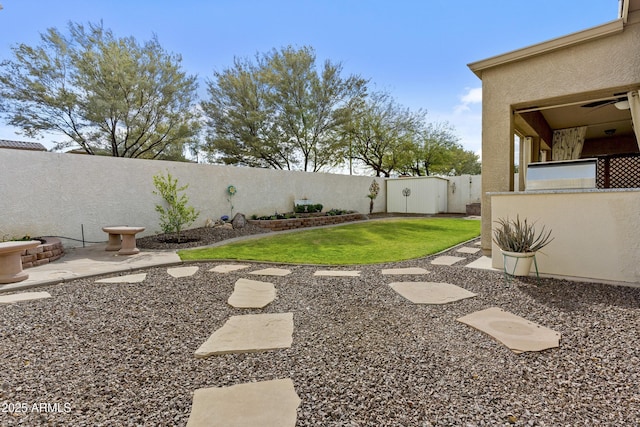 view of yard with a patio area and a fenced backyard