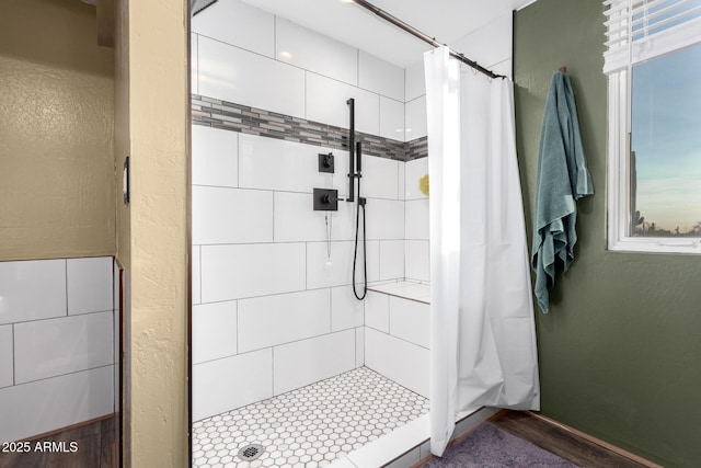 full bathroom with a shower stall