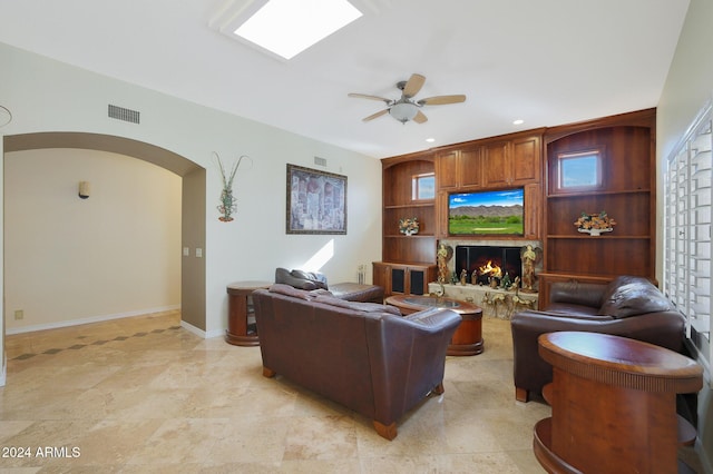 living room with ceiling fan