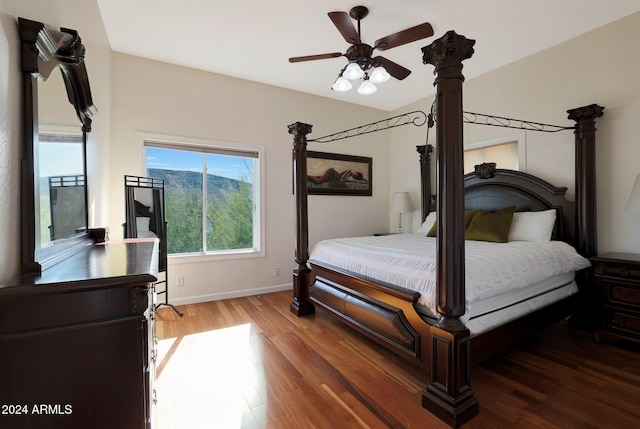 bedroom featuring hardwood / wood-style flooring and ceiling fan