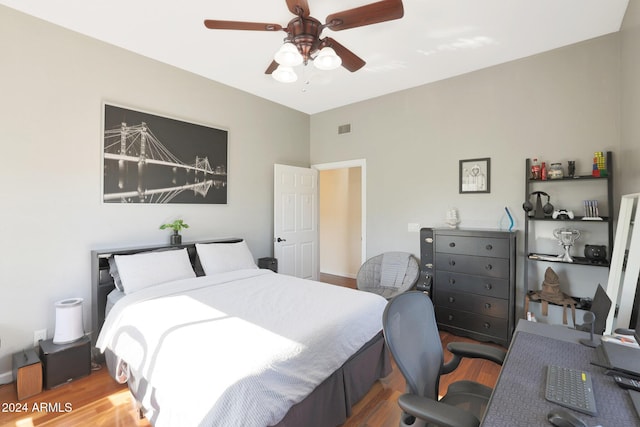 bedroom featuring wood-type flooring and ceiling fan