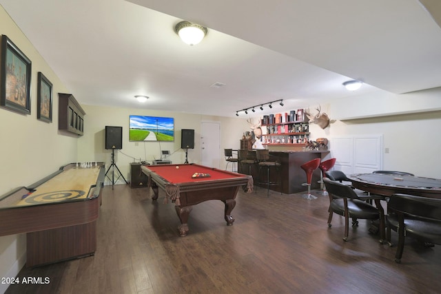 rec room with dark hardwood / wood-style floors, pool table, and indoor bar