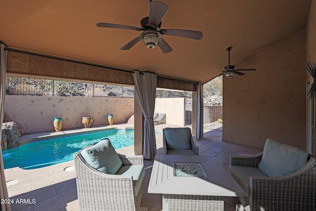 view of patio with a fenced in pool