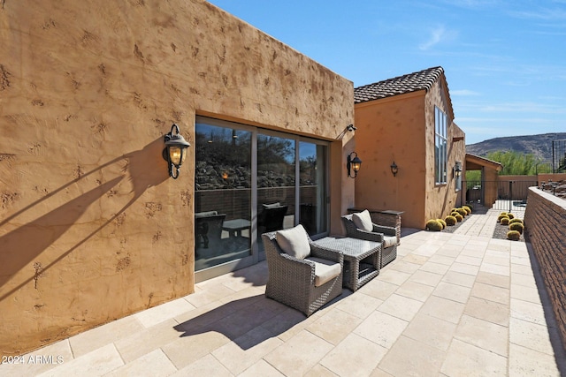 view of patio featuring a mountain view