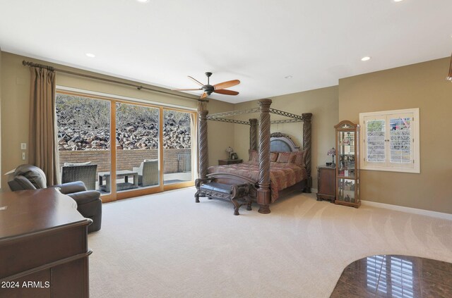 carpeted bedroom featuring access to exterior and ceiling fan