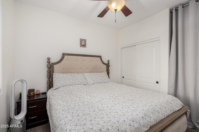 bedroom featuring a ceiling fan and a closet