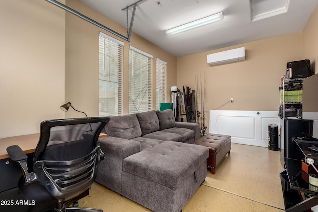 living room featuring an AC wall unit