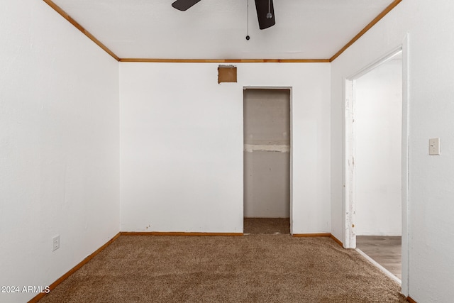 unfurnished bedroom featuring carpet floors, a closet, ornamental molding, and ceiling fan