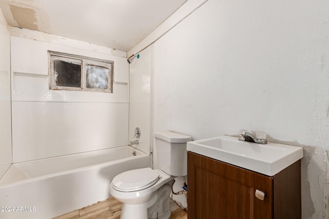 full bathroom with vanity, shower / bath combination, and toilet