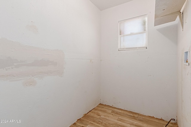 spare room featuring light hardwood / wood-style flooring