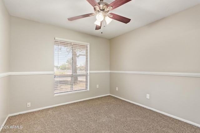 18402 N 17th Ave, Phoenix, AZ 85023 - spare room featuring carpet, baseboards, and ceiling fan