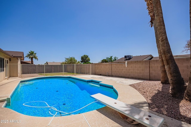 18402 N 17th Ave, Phoenix, AZ 85023 - view of pool featuring a fenced backyard, a diving board, and a patio