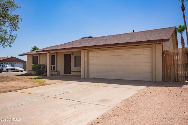 18402 N 17th Ave, Phoenix, AZ 85023 - ranch-style home featuring driveway, stucco siding, fence, and a garage