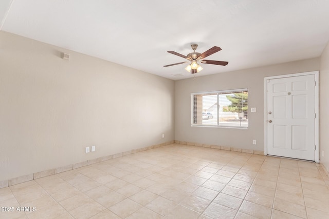 18402 N 17th Ave, Phoenix, AZ 85023 - empty room with ceiling fan, light tile patterned floors, and baseboards