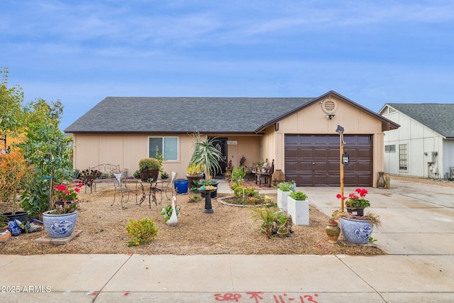 single story home featuring a garage