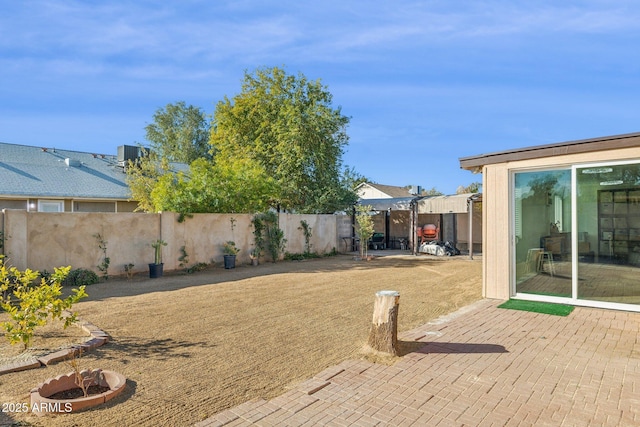 view of yard featuring cooling unit, a pergola, and a patio