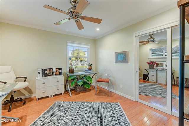 living area with ceiling fan, light hardwood / wood-style flooring, and ornamental molding