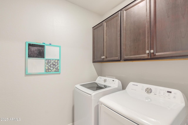 686 N 152nd Dr, Goodyear, AZ 85338 - washroom featuring cabinet space and separate washer and dryer