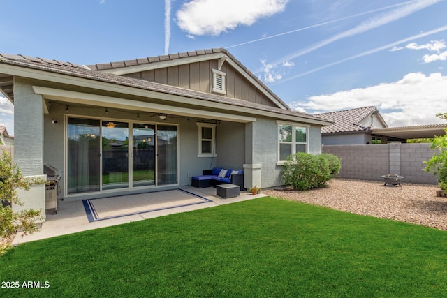 686 N 152nd Dr, Goodyear, AZ 85338 - rear view of house featuring a patio, a yard, fence, and a ceiling fan