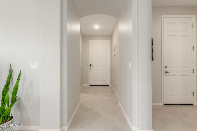 686 N 152nd Dr, Goodyear, AZ 85338 - corridor featuring light tile patterned floors, baseboards, and recessed lighting