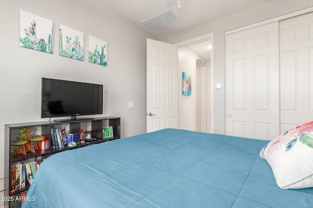 686 N 152nd Dr, Goodyear, AZ 85338 - bedroom featuring arched walkways, a closet, and visible vents