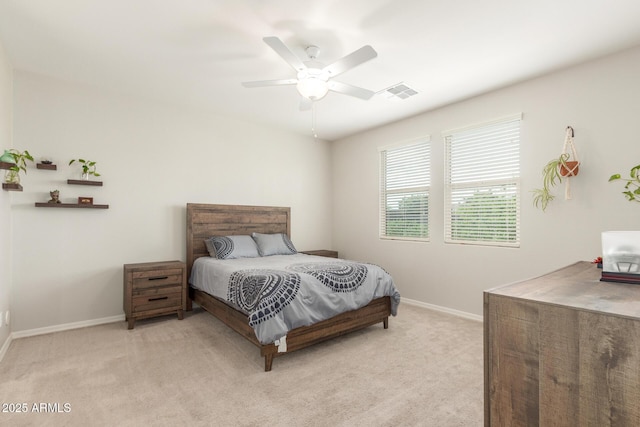 686 N 152nd Dr, Goodyear, AZ 85338 - bedroom with visible vents, baseboards, light colored carpet, and ceiling fan