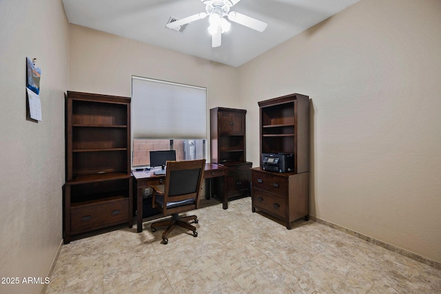 office area featuring visible vents, baseboards, and a ceiling fan