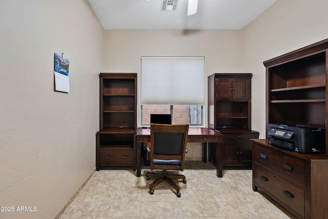 home office with baseboards, visible vents, and ceiling fan