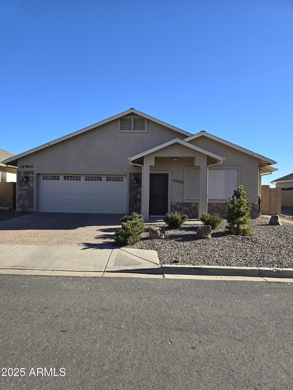 ranch-style home with a garage