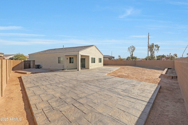 rear view of house with a patio area